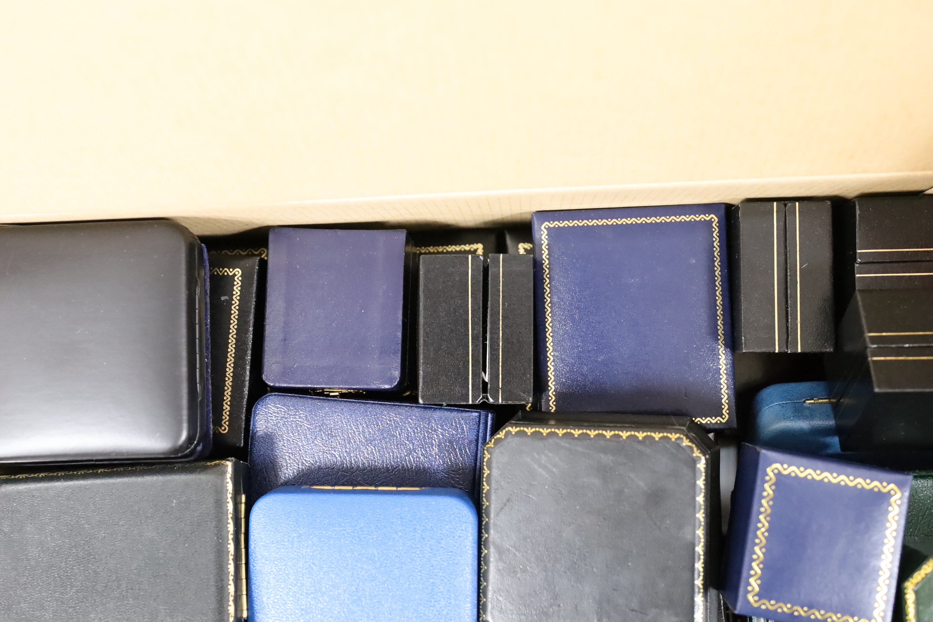 A large quantity of assorted empty jewellery boxes.